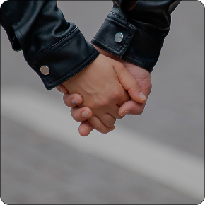 a gay couple holding hands